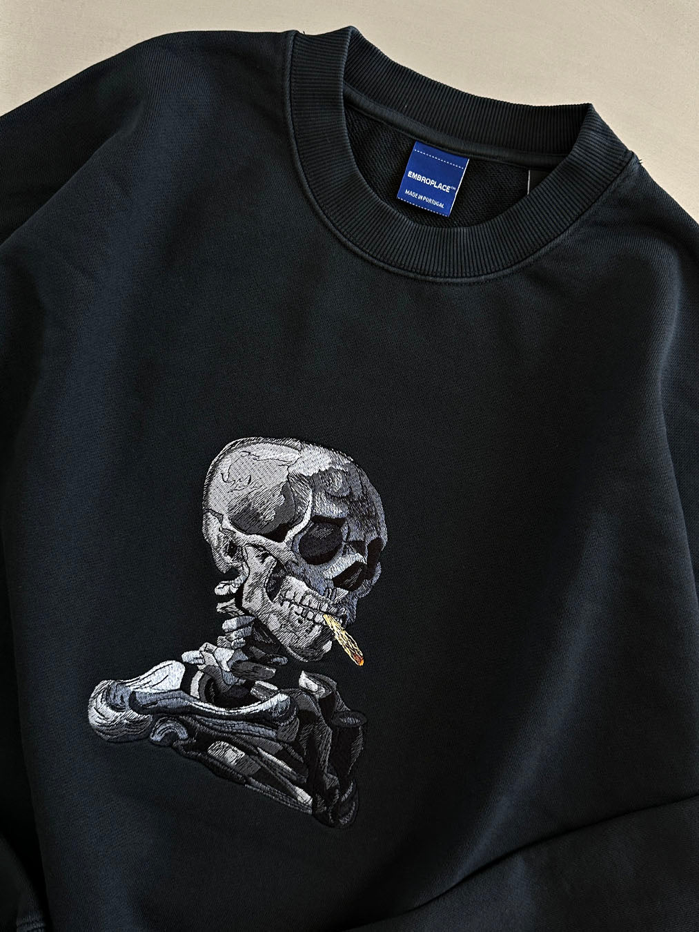 SKULL OF A SKELETON WITH BURNING CIGARETTE