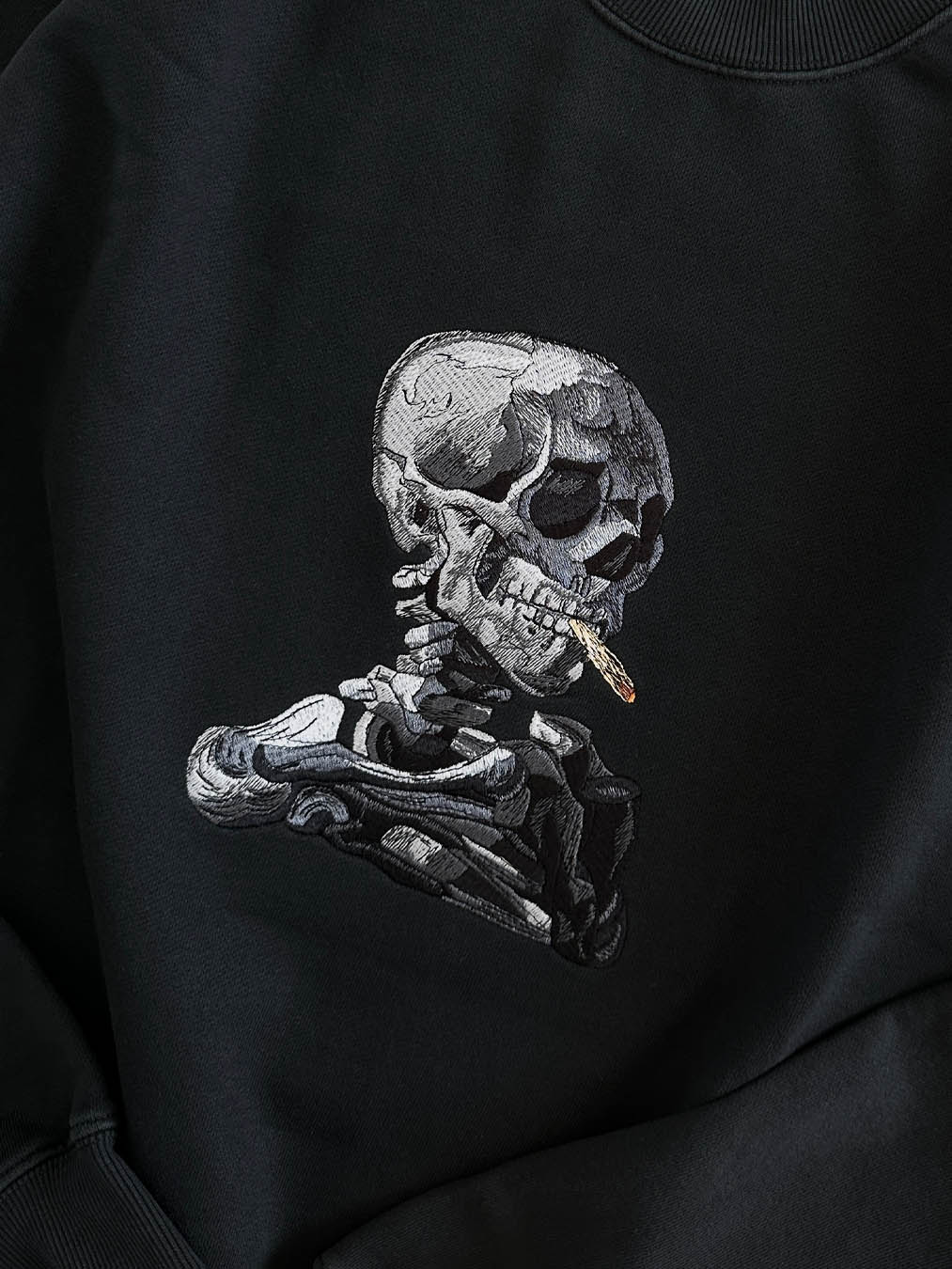 Skull of a Skeleton with Burning Cigarette